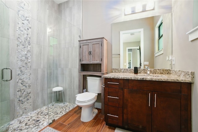 1912 Jung Blvd E, Naples, FL 34120 - full bath featuring a stall shower, vanity, and wood finished floors