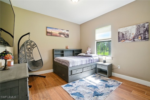 1912 Jung Blvd E, Naples, FL 34120 - bedroom with light wood-type flooring