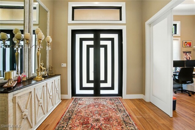 1912 Jung Blvd E, Naples, FL 34120 - foyer featuring baseboards and light wood-style flooring