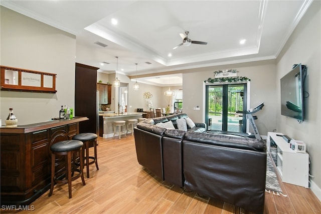 1912 Jung Blvd E, Naples, FL 34120 - living area with a raised ceiling, a ceiling fan, crown molding, light wood-style flooring, and recessed lighting