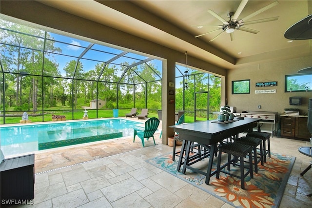 1912 Jung Blvd E, Naples, FL 34120 - swimming pool featuring a patio area, ceiling fan, glass enclosure, and a yard