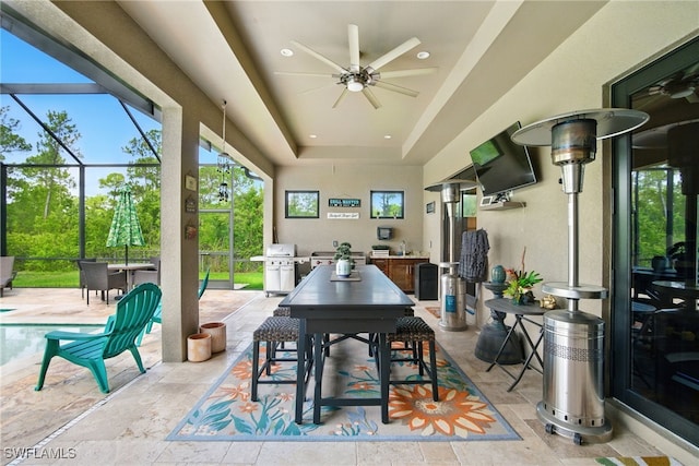 1912 Jung Blvd E, Naples, FL 34120 - view of patio / terrace featuring outdoor dining space, ceiling fan, and a lanai