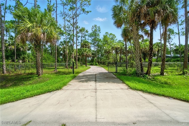 1912 Jung Blvd E, Naples, FL 34120 - view of road featuring a gated entry