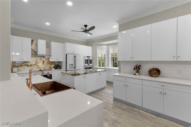 5040 Yacht Harbor Cir Unit 6, Naples, FL 34112 - kitchen featuring refrigerator with ice dispenser, wall chimney range hood, a ceiling fan, decorative backsplash, and recessed lighting