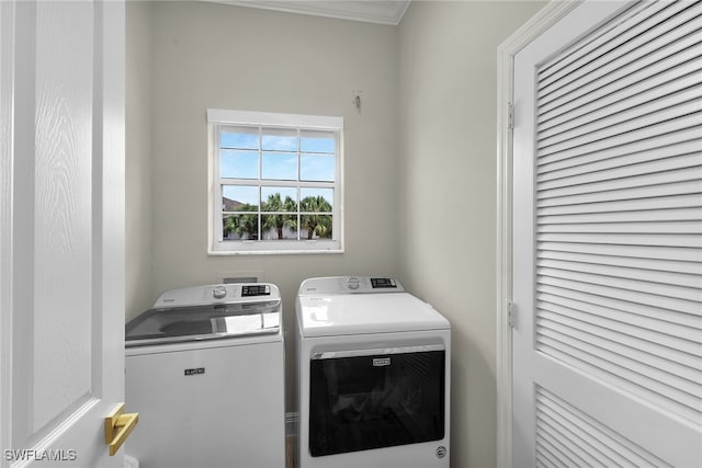 5040 Yacht Harbor Cir Unit 6, Naples, FL 34112 - washroom with separate washer and dryer and ornamental molding