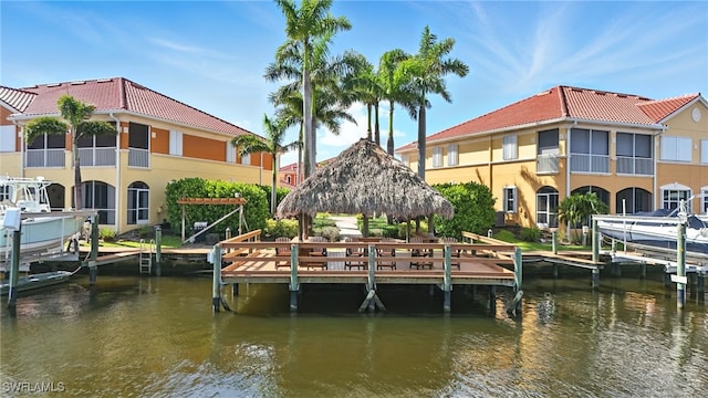 178 Shadroe Cove Cir Unit 903, Cape Coral, FL 33991 - dock featuring boat lift, a gazebo, and a water view