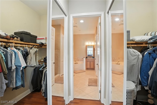 178 Shadroe Cove Cir Unit 903, Cape Coral, FL 33991 - spacious closet with wood finished floors