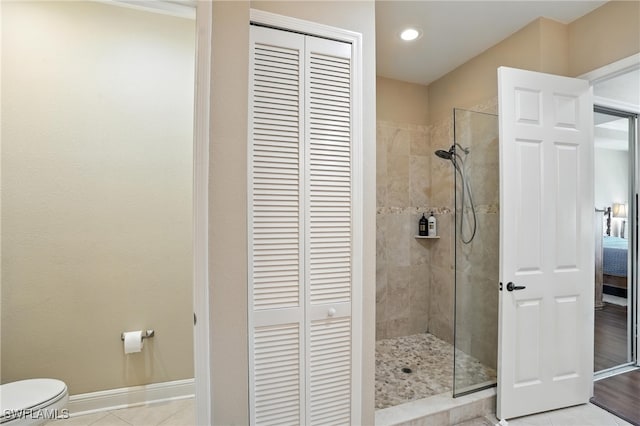 178 Shadroe Cove Cir Unit 903, Cape Coral, FL 33991 - ensuite bathroom with a closet, a walk in shower, tile patterned flooring, and recessed lighting