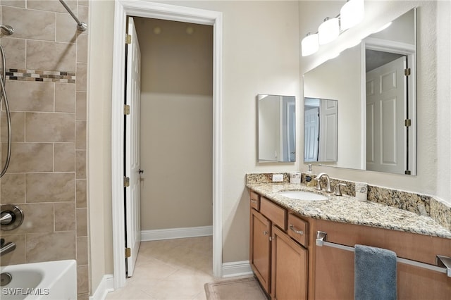 178 Shadroe Cove Cir Unit 903, Cape Coral, FL 33991 - bathroom with vanity, tub / shower combination, and tile patterned flooring