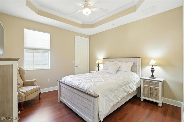 178 Shadroe Cove Cir Unit 903, Cape Coral, FL 33991 - bedroom featuring a raised ceiling, crown molding, dark wood finished floors, and ceiling fan