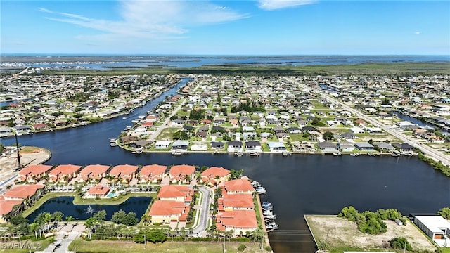 178 Shadroe Cove Cir Unit 903, Cape Coral, FL 33991 - aerial overview of property's location featuring nearby suburban area and a large body of water