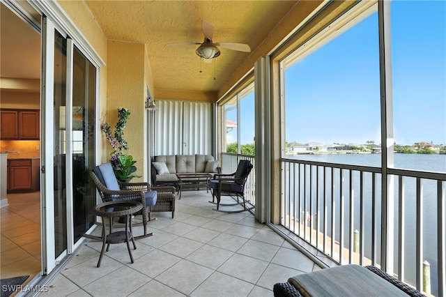 178 Shadroe Cove Cir Unit 903, Cape Coral, FL 33991 - sunroom / solarium with a water view, ceiling fan, and an outdoor living space