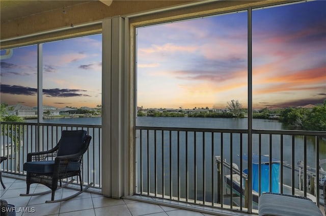 178 Shadroe Cove Cir Unit 903, Cape Coral, FL 33991 - sunroom / solarium featuring a water view