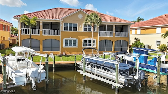 178 Shadroe Cove Cir Unit 903, Cape Coral, FL 33991 - dock featuring boat lift and a water view