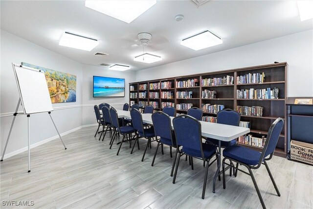 6769 Berwick Pl, Naples, FL 34104 - home office featuring light wood-style floors