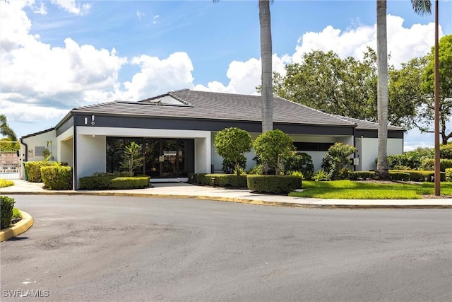 6769 Berwick Pl, Naples, FL 34104 - view of front of home with stucco siding