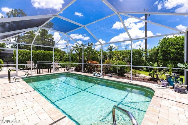 6769 Berwick Pl, Naples, FL 34104 - swimming pool featuring a patio area and glass enclosure