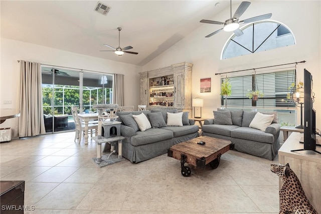 6769 Berwick Pl, Naples, FL 34104 - living room with a ceiling fan, high vaulted ceiling, and light tile patterned floors