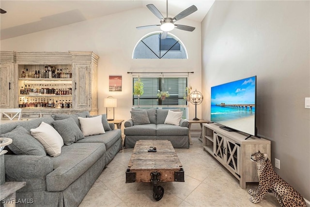 6769 Berwick Pl, Naples, FL 34104 - living room with a ceiling fan, light tile patterned flooring, and high vaulted ceiling