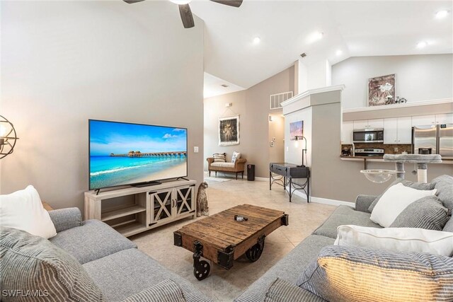 6769 Berwick Pl, Naples, FL 34104 - living area featuring high vaulted ceiling, ceiling fan, recessed lighting, and light tile patterned floors