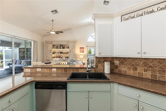 6769 Berwick Pl, Naples, FL 34104 - kitchen featuring dishwasher, backsplash, green cabinetry, a ceiling fan, and open floor plan