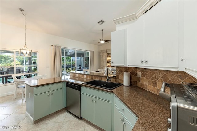 6769 Berwick Pl, Naples, FL 34104 - kitchen featuring dishwasher, a peninsula, backsplash, green cabinetry, and a ceiling fan