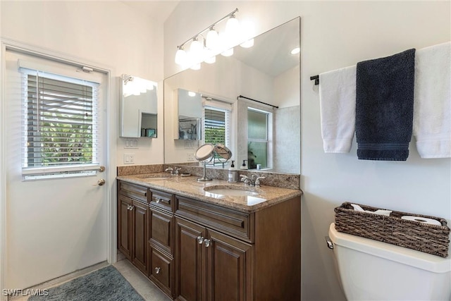 6769 Berwick Pl, Naples, FL 34104 - full bath featuring plenty of natural light and double vanity
