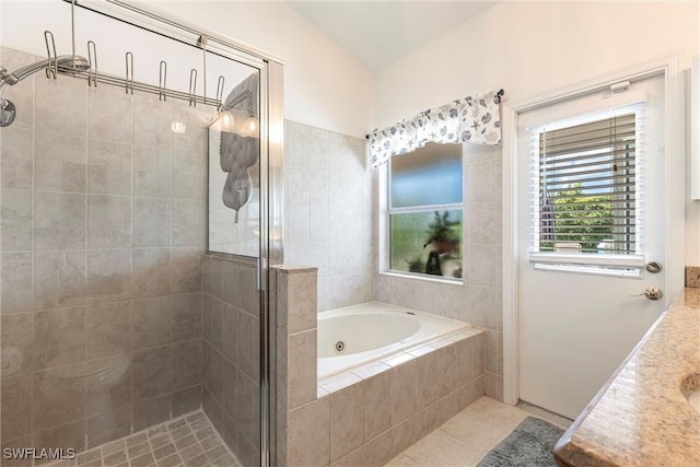 6769 Berwick Pl, Naples, FL 34104 - bathroom featuring a stall shower, a whirlpool tub, tile patterned floors, and vanity