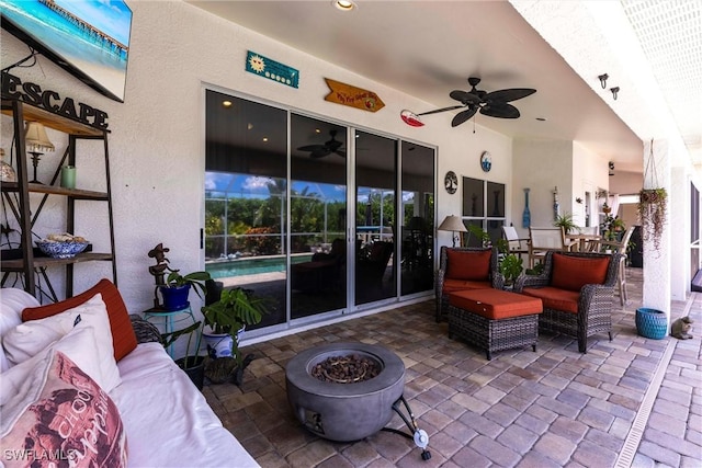 6769 Berwick Pl, Naples, FL 34104 - view of patio / terrace with a ceiling fan and an outdoor living space with a fire pit