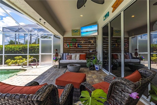 6769 Berwick Pl, Naples, FL 34104 - sunroom featuring a ceiling fan, lofted ceiling, and outdoor lounge area