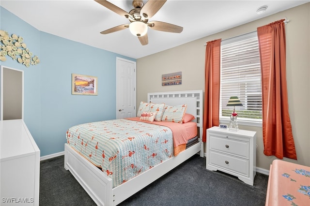 14803 Edgewater Cir, Naples, FL 34114 - bedroom with dark colored carpet and ceiling fan