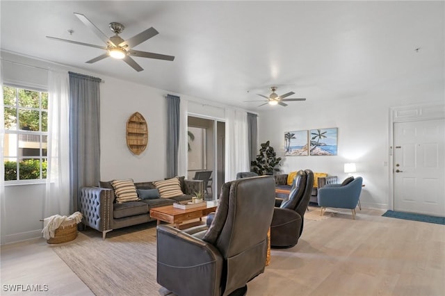 3948 Pomodoro Cir Unit 102, Cape Coral, FL 33909 - living area featuring ceiling fan and light wood-type flooring