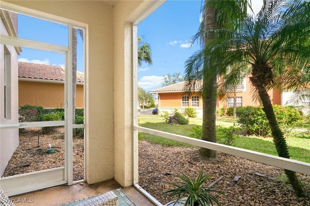 3948 Pomodoro Cir Unit 102, Cape Coral, FL 33909 - doorway to outside with healthy amount of natural light