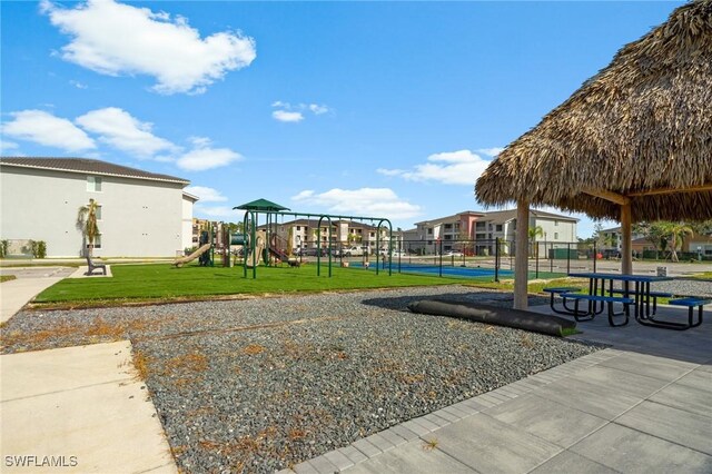 3948 Pomodoro Cir Unit 102, Cape Coral, FL 33909 - view of property's community with a tennis court