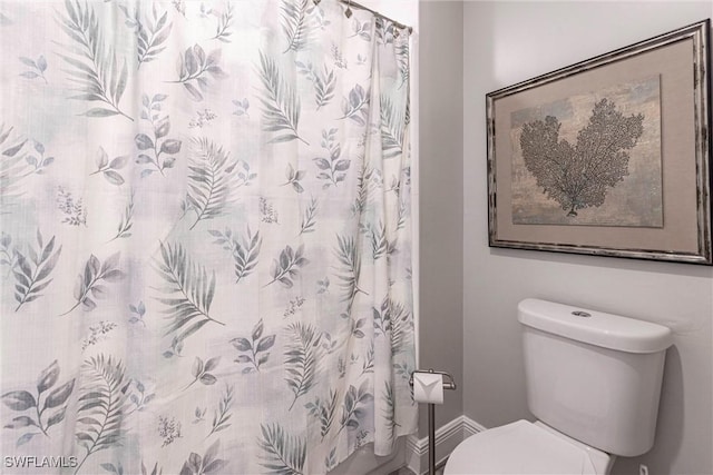 4372 Bittern Ct, Naples, FL 34119 - bathroom with toilet and curtained shower