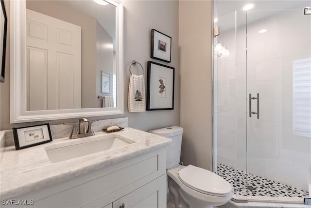 4372 Bittern Ct, Naples, FL 34119 - bathroom featuring a stall shower and vanity