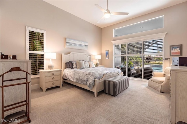 4372 Bittern Ct, Naples, FL 34119 - bedroom with light carpet, access to outside, and ceiling fan
