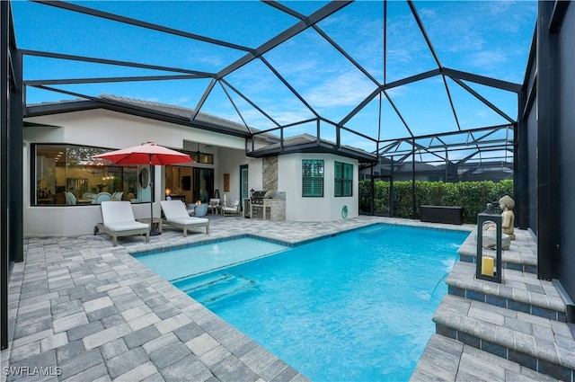 10082 Palazzo Dr, Naples, FL 34119 - outdoor pool with a patio area and glass enclosure