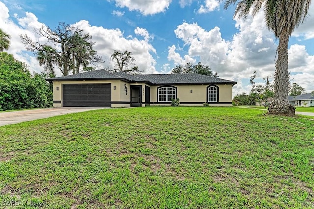 5482 Globe Ter, North Port, FL 34286 - ranch-style house with stucco siding, an attached garage, driveway, and a front yard