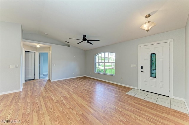 5482 Globe Ter, North Port, FL 34286 - foyer with a ceiling fan, light wood-type flooring, and vaulted ceiling