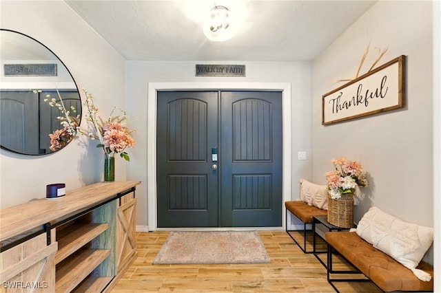 2491 43rd St SW, Naples, FL 34116 - entryway with light wood finished floors and baseboards