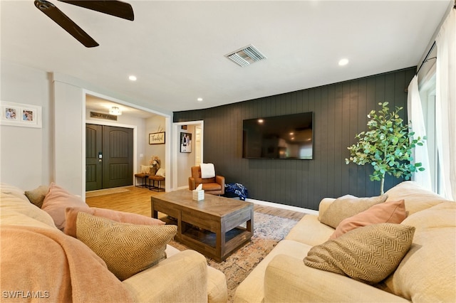 2491 43rd St SW, Naples, FL 34116 - living room with wood finished floors, a ceiling fan, and recessed lighting