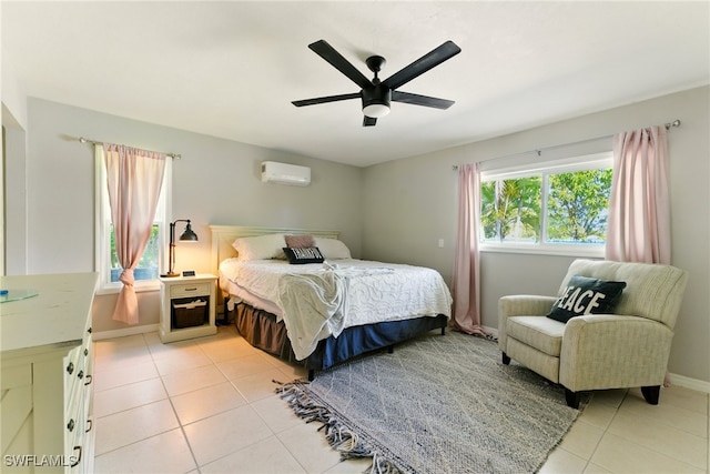 2491 43rd St SW, Naples, FL 34116 - bedroom with a wall mounted air conditioner, light tile patterned floors, and a ceiling fan