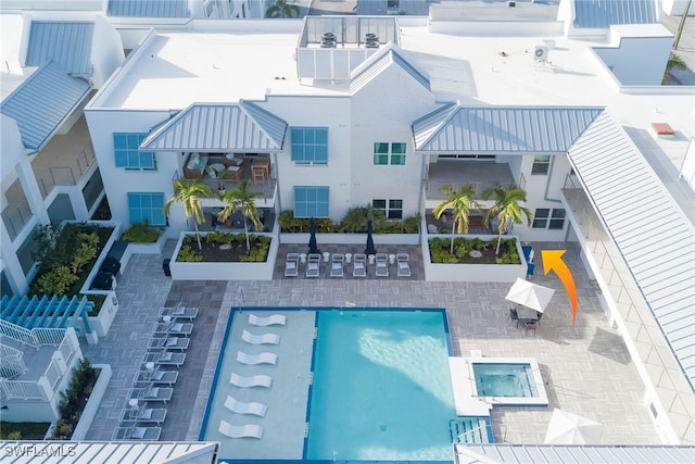 201 8th St S Unit 208, Naples, FL 34102 - view of swimming pool featuring a patio area and a pool with connected hot tub
