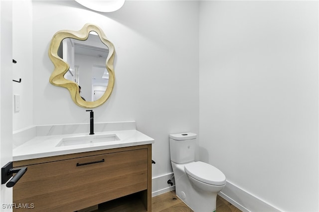 201 8th St S Unit 208, Naples, FL 34102 - bathroom with vanity and wood finished floors
