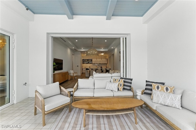201 8th St S Unit 208, Naples, FL 34102 - living area with beamed ceiling, a chandelier, and recessed lighting