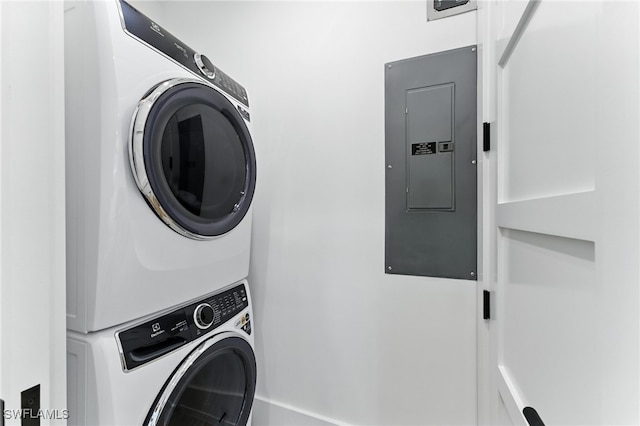 201 8th St S Unit 208, Naples, FL 34102 - laundry room featuring stacked washer and clothes dryer and electric panel