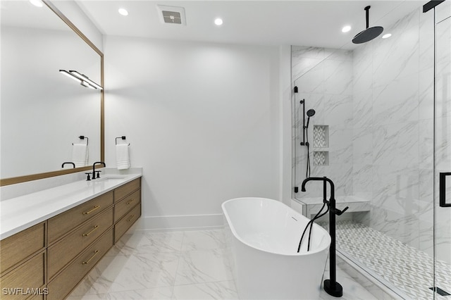 201 8th St S Unit 208, Naples, FL 34102 - bathroom featuring marble look tiles, a freestanding bath, vanity, a marble finish shower, and recessed lighting