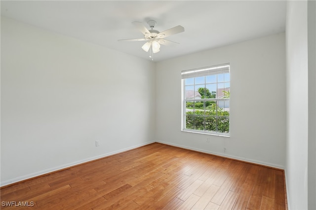 6643 Craven Hill Way, Naples, FL 34104 - spare room with light wood finished floors and a ceiling fan