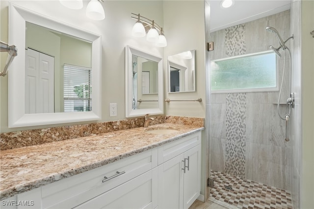 6643 Craven Hill Way, Naples, FL 34104 - bathroom with plenty of natural light, a stall shower, and vanity
